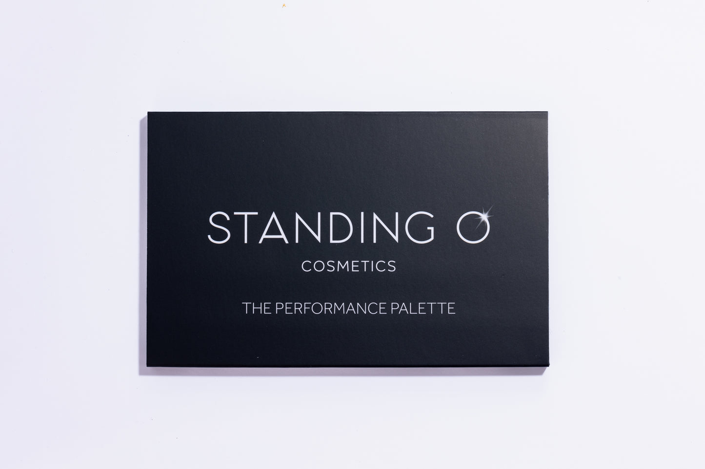 The front view of Performance Palette, a 15 Pan Eye shadow palette. Standing O Logo is imprinted on the top.