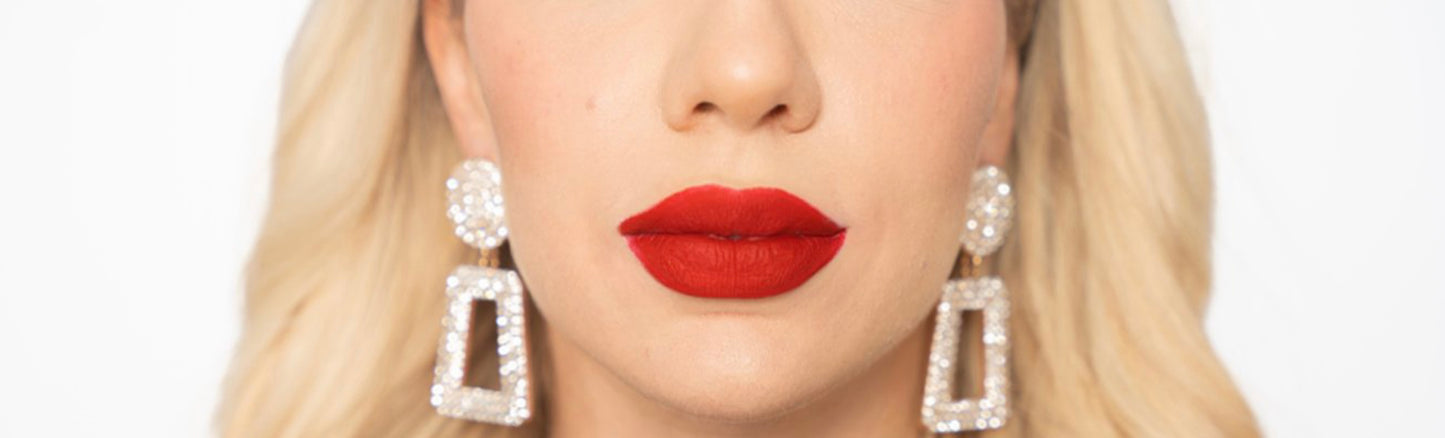 Red lipstick and liner shown on model
