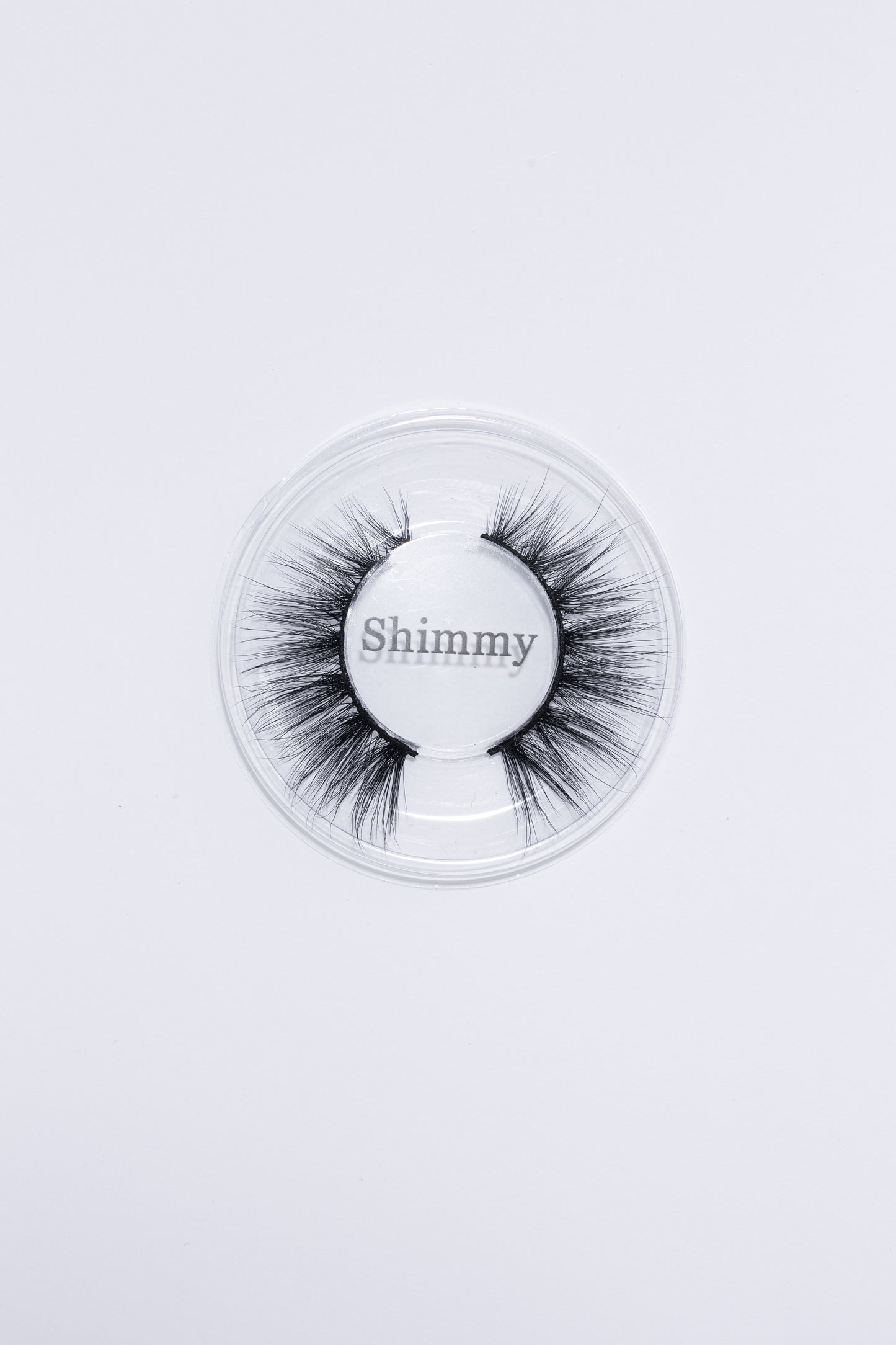Shimmy Lash, laying on a white background.