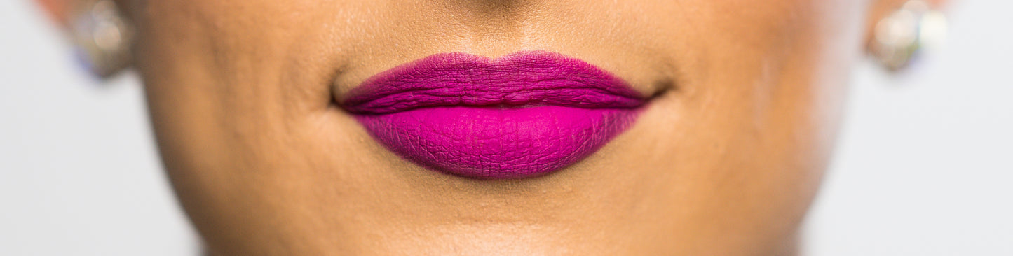 bright fuchcsia lipstick on model