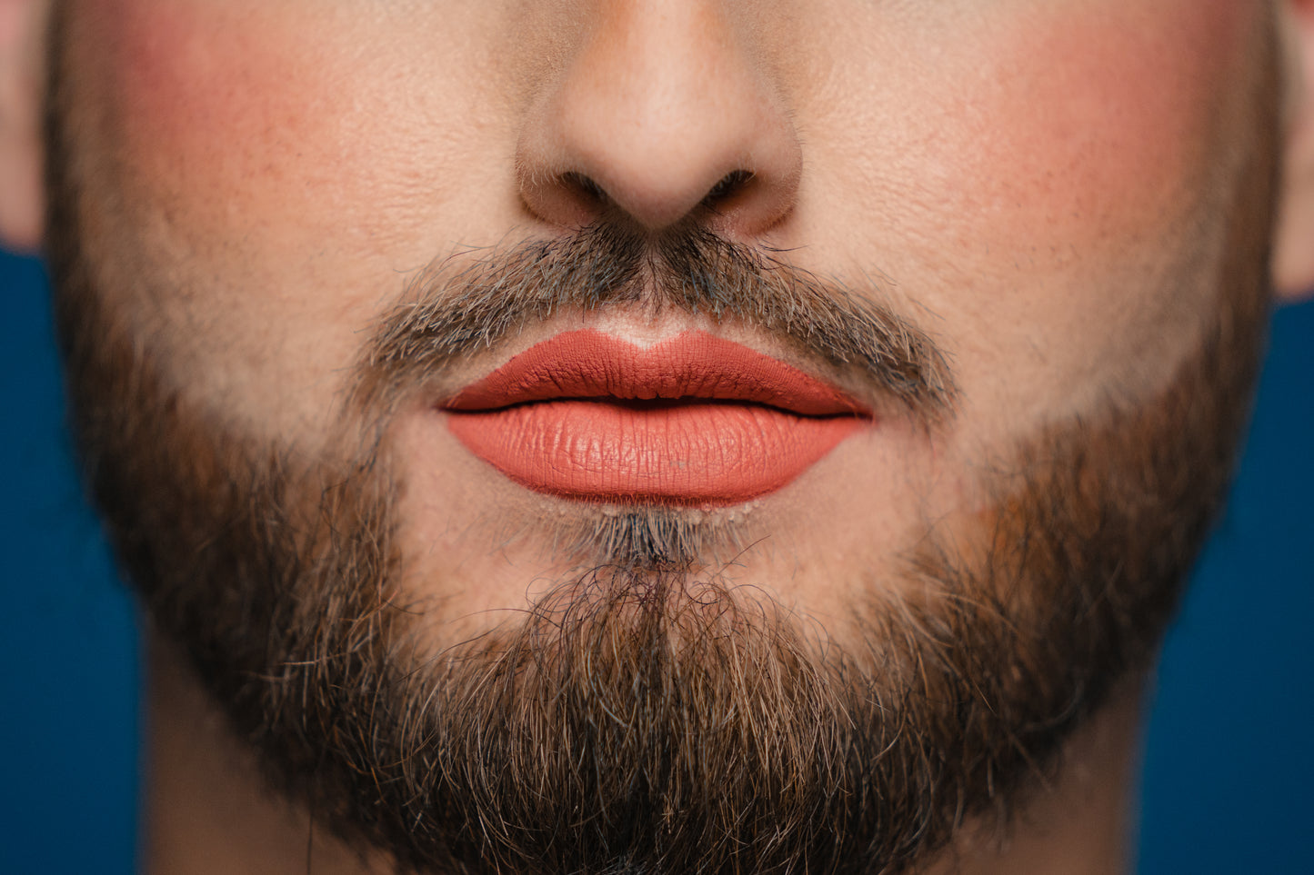 rosey nude toned lipstick on model