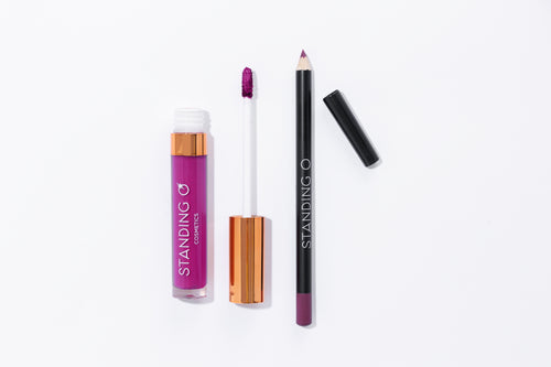 Duo flat lay, including: the matte liquid lipstick and liner, shown without the tops to showcase color: bright fuchsia shade.