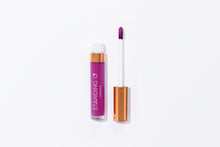 Load image into Gallery viewer, Tube of lipstick with a gold top shown open to showcase the applicator and color: bright fuchsia lipstick.
