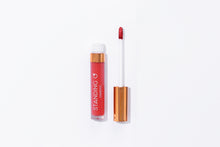 Load image into Gallery viewer, Tube of lipstick with a gold top shown open to showcase the applicator and color: orange-red lipstick.
