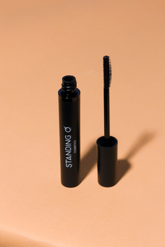 Open mascara tube displaying wand for easy application.
