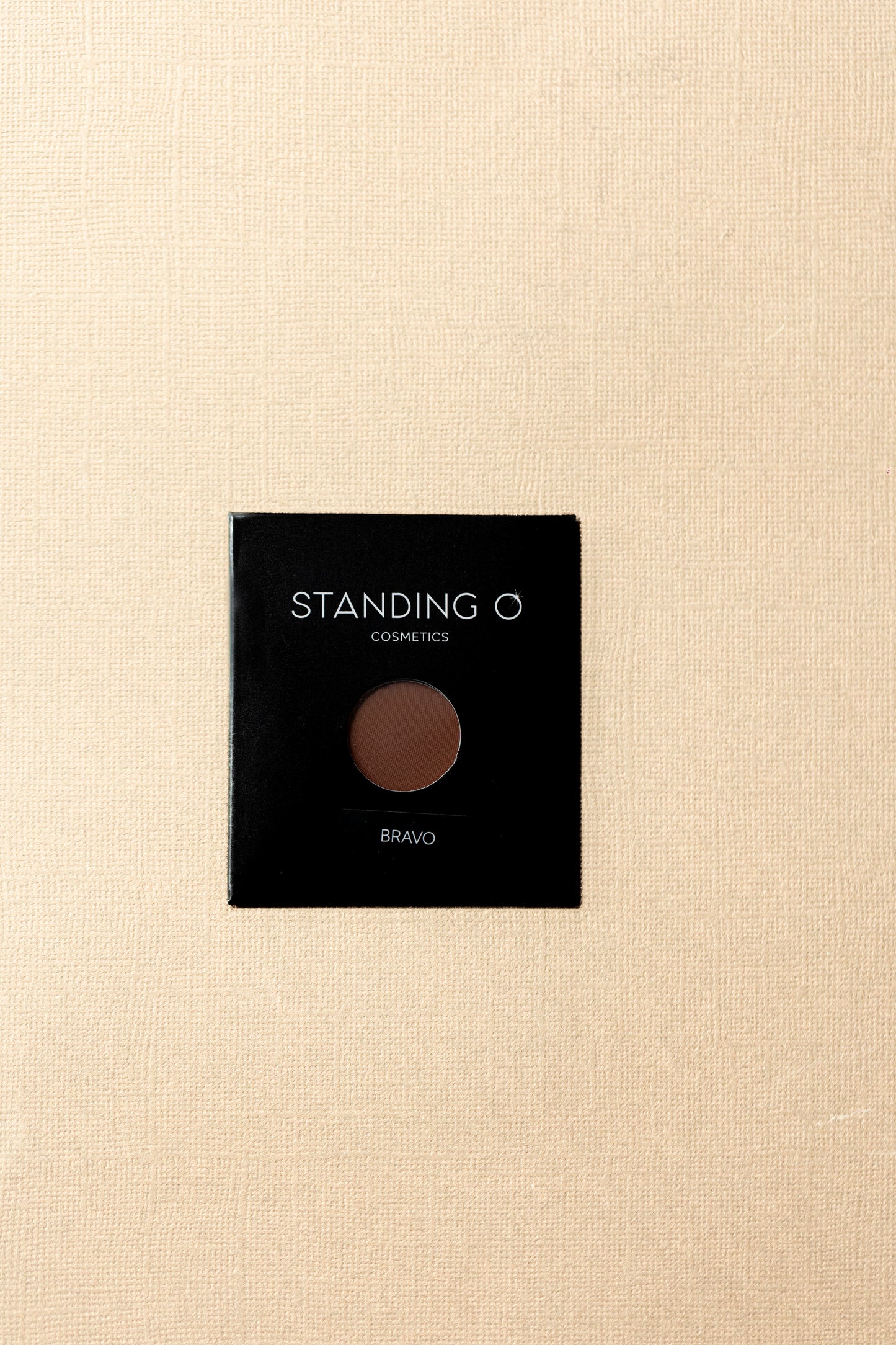 Discover the allure of 'Standing O' single eyeshadow in 'Bravo', offering a rich brown color payoff.