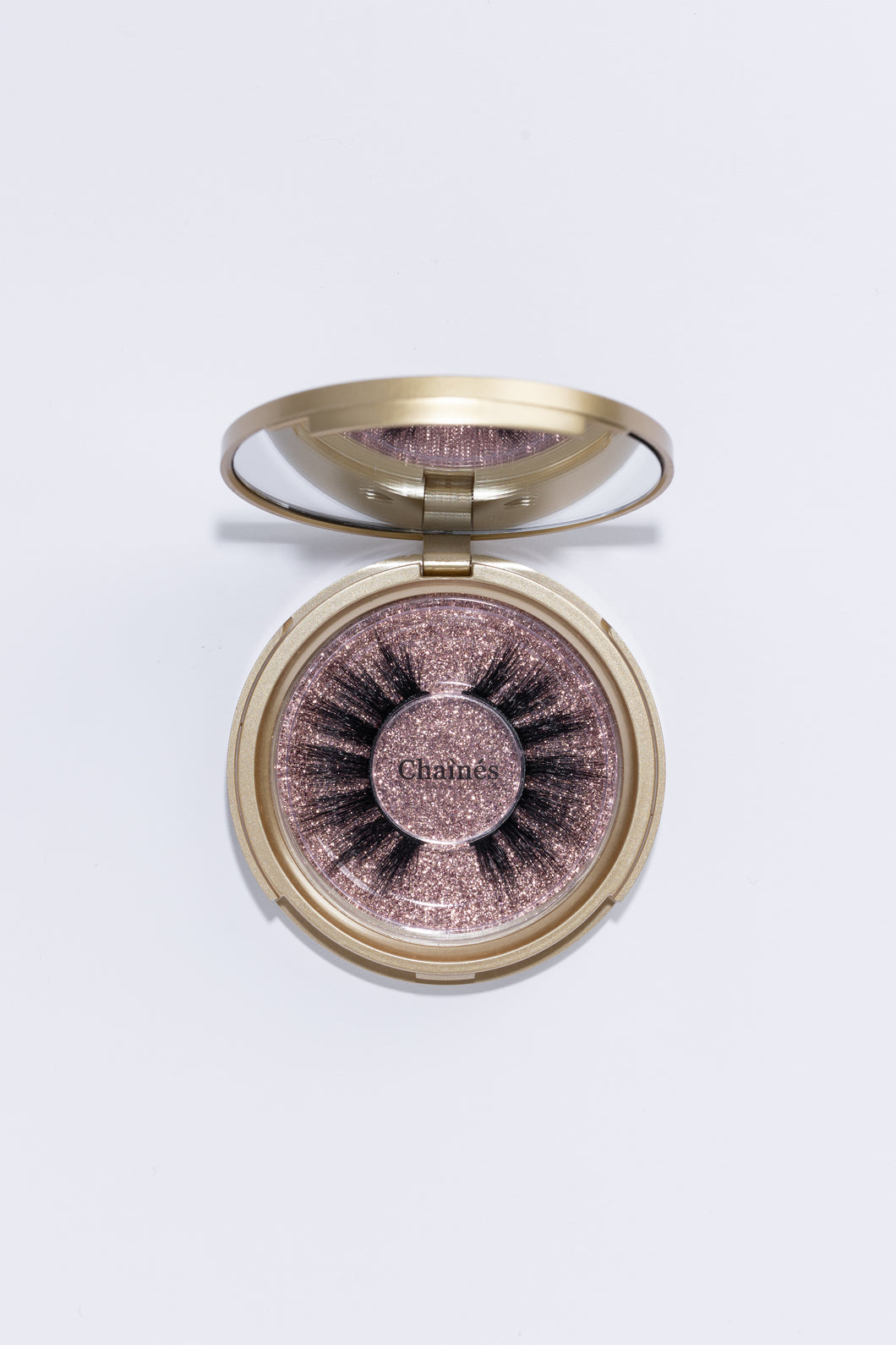 Classic gold Compact with lash style: Chaines. 