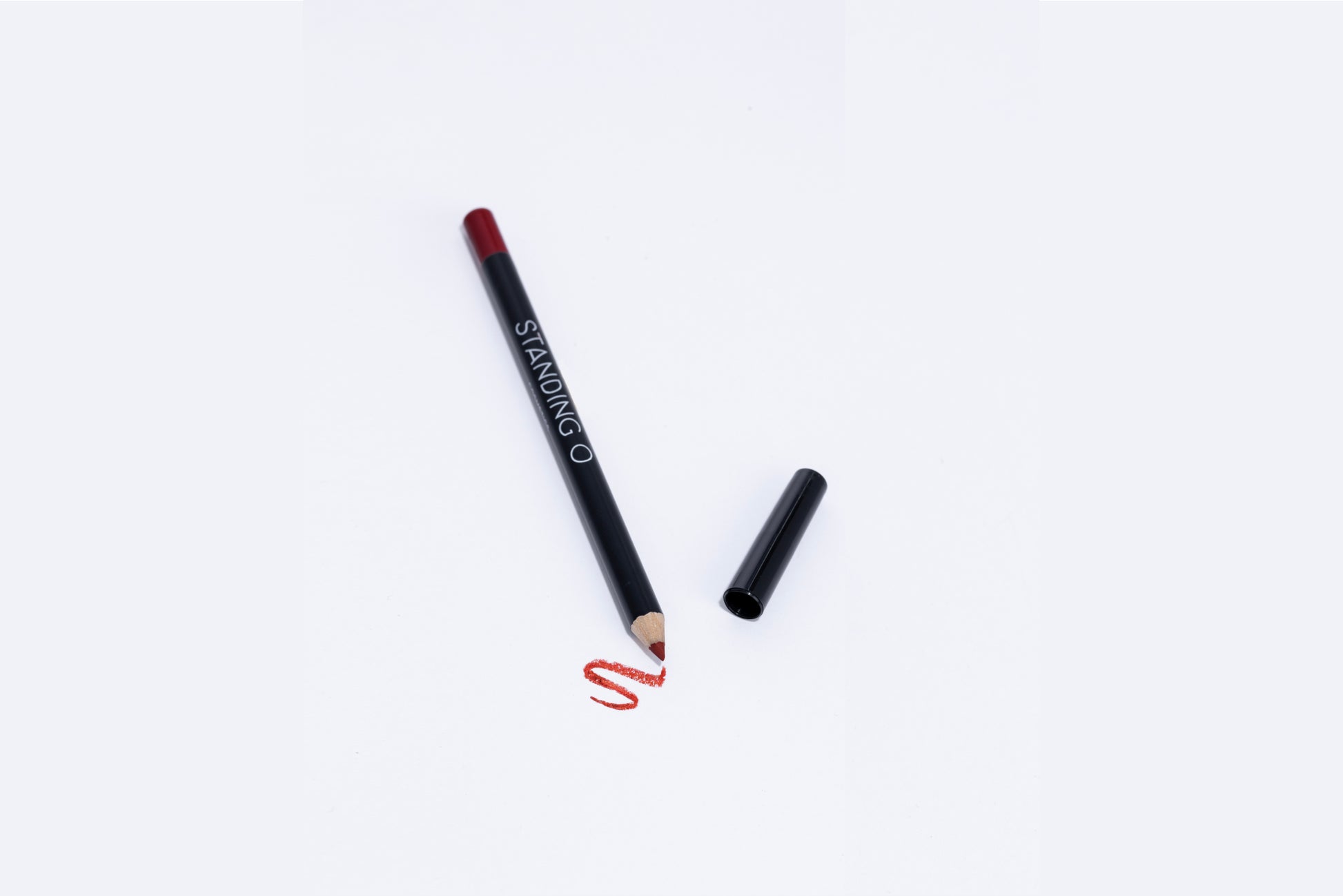 Lip liner pencil with swatch to showcase color of liner, classic red liner.